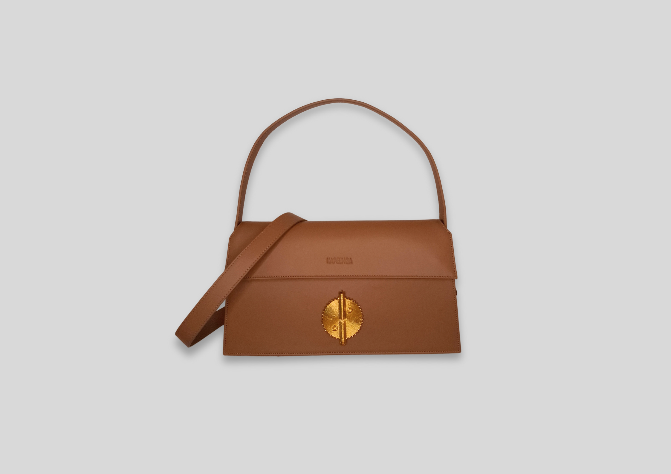 Malaika 2.0 luxurious leather handbag in tan with elegant gold logo, perfect for modern women.